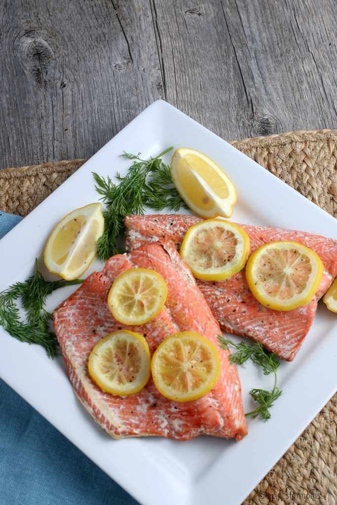 Instant Pot Salmon with lemon slices on a white plate